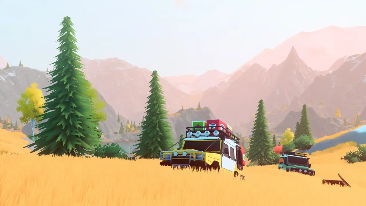 Two off-road vehicles exploring a forested mountain valley